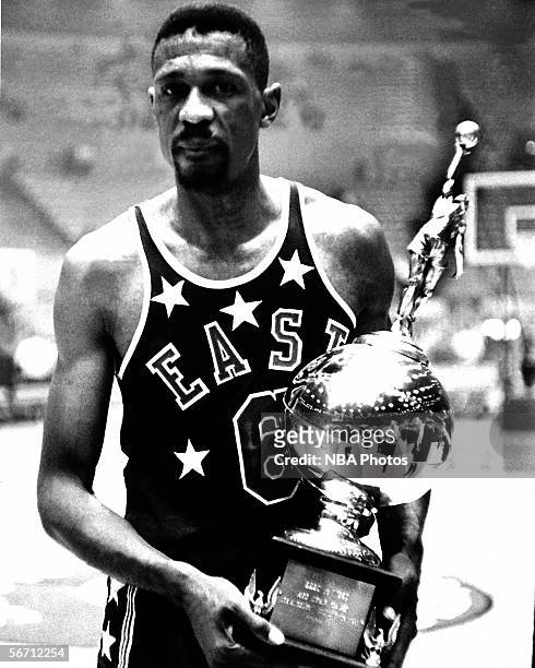 Bill Russell of the Boston Celtics is awarded the 1963 NBA All-Star MVP Trophy after the 1963 NBA All-Star Game circa 1963 in Los Angeles,...