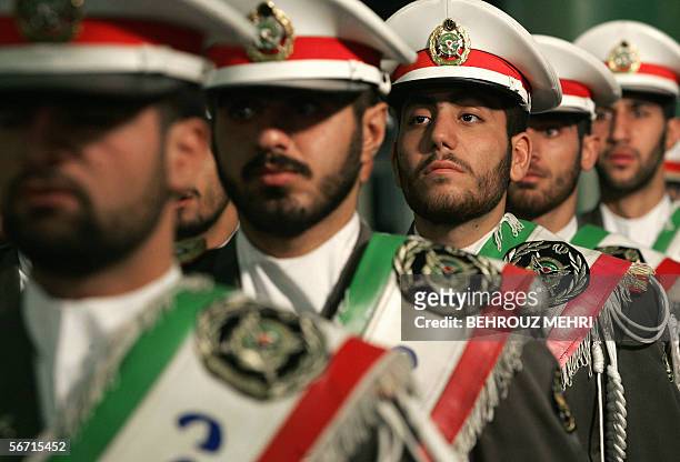 Iranian protocol soldiers stand guard during a ceremony to mark the 27th anniversary of the Islamic revolution at the mausoleum of Iran's late...