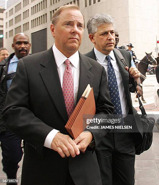 Houston, UNITED STATES: Former Enron CEO Jeffrey Skilling and his attorney Daniel Petrocelli return to the Bob Casey Federal Court House after the...