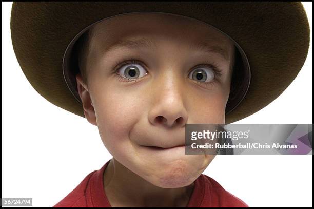 portrait of a boy making a face - ugly boys fotos stock-fotos und bilder