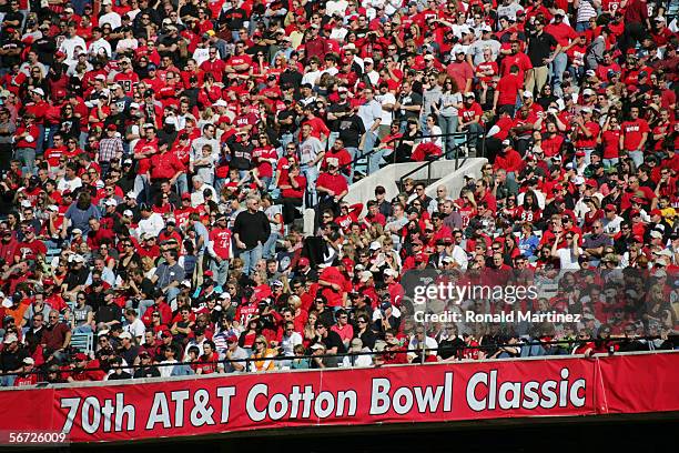 Fans watch the Texas Tech Red Raiders game against the Alabama Crimson Tide during the AT&T Cotton Bowl on January 2, 2006 in Dallas, Texas. The...