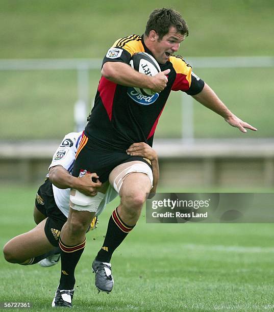 Steven Bates of the Chiefs runs with the ball during the Super 14 rugby pre-season match between the Hurricanes and the Chiefs played at the...