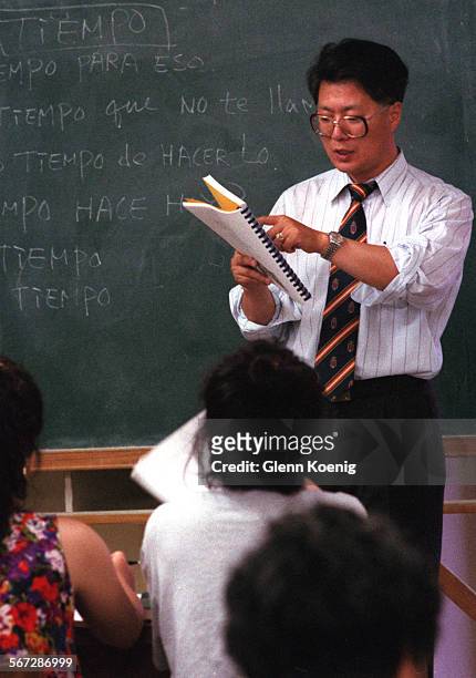Spanish class 08/31/95#44330Michael Kang as he teaches a Spanish language class offered by the Garden Grove Korean Association. At the Korean...