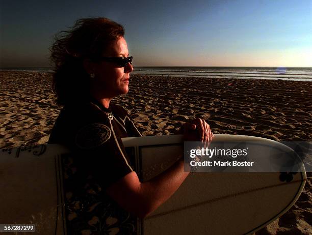 Hartman.Board.102798.MBMary Hartmann, sister of slain comedian Phil Hartman is an accomplished surfer with a store in Dana Point named "Girl In...