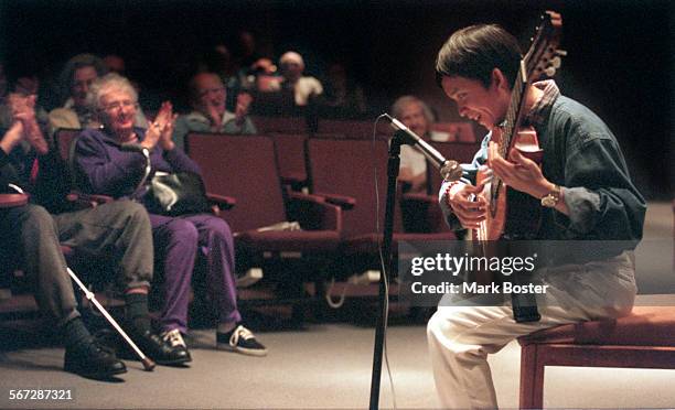 Guitarist.Perform.032698.MBDat Nguyen is a 28yearold Amerasian orphan who has been blind since birth but who posesses a remarkable gift to play...