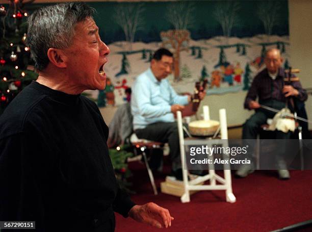 Seniors.opera.1221.AAGIrvine resident Frank Kuo sings a Chinese opera song retelling a 2,000 year old story. A Beijing native, Kuo regularly...