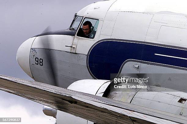 Airline.4.LS. Jose Diaz, a 28yearold pilot for Catalina Flying Boats, starts up engines of a DC3 that is nearly twice his age which the company...