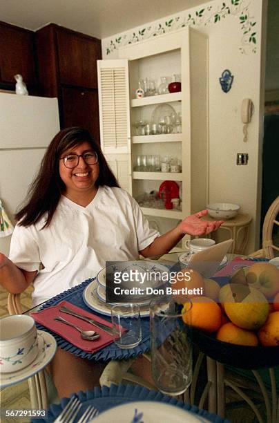 Help.Carlisle.DB.8/12/97.MissionViejo. Teresa Carlisle gestures at all the new things around her kitchen. When she returned home from a trip this...