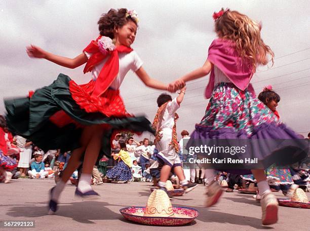 Cinco.hat1.KH.5/3/95.Louise Corona and Olivia Stone perform the Mexican Hat Dance during Richman School's Cinco de Mayo at the Fullerton Farmer's...