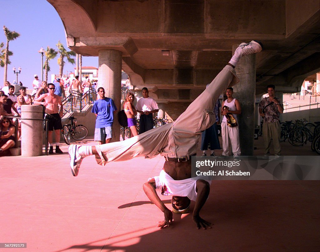 ME.wildart.breakdance.0705.AS––HUNTINGTON BEACH––Jeremy "Silhouette" Washington, 21, of San Bernadin