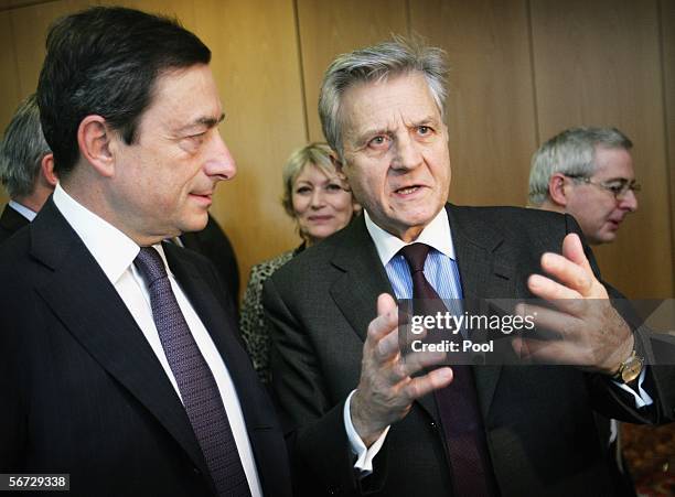 President of the European Central Bank Jean-Claude Trichet talks with the new Governor of the Banca d'Italia Mario Draghi at the ECB Headquarters...