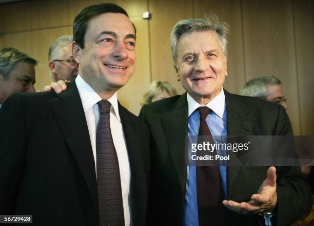 President of the European Central Bank Jean-Claude Trichet talks with the new Governor of the Banca d'Italia Mario Draghi at the ECB Headquarters...