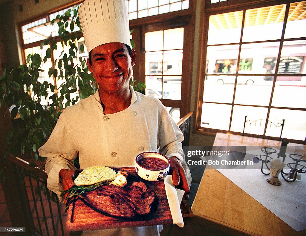 Gallos Grill chef Alfonso Herrera with Cecina Estilo Yecapiztla main course and corn tortillas with 