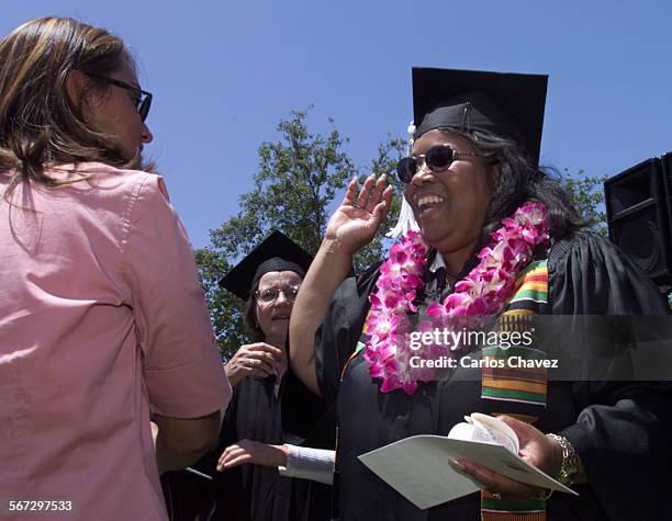 Vernice Zomalt,52 of Oxnard, recieved her Baccalaureate Degree friday with several hundred other graduates of Cal State University Northridge Ventura...