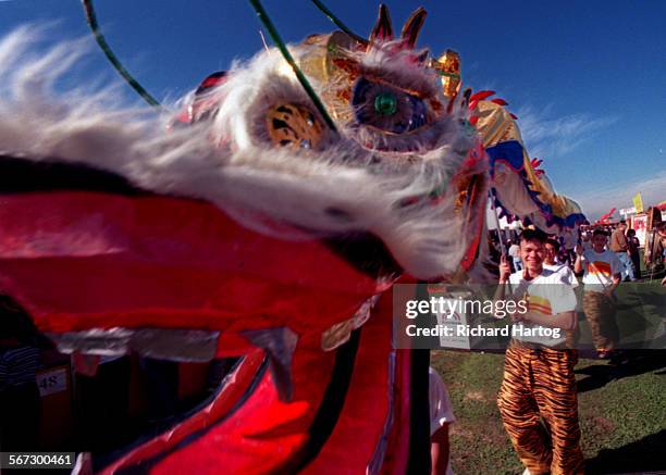 Tet.Dragon.RH021399A colorful dragon fueled by the Long Ho Hoi performers makes its way through the Tet festival1999, Saturday afternoon at the...