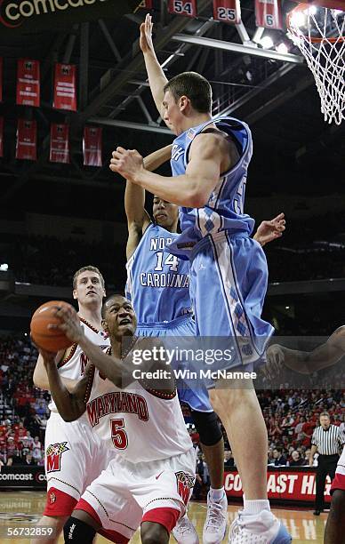 Strawberry of the Maryland Terrapins drives to the basket against Tyler Hansbrough and Danny Green of the North Carolina Tar Heels during first half...