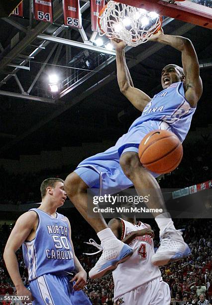 Reyshawn Terry of the North Carolina Tar Heels dunks past teammate Tyler Hansbrough and Travis Garrison of the Maryland Terrapins during second half...