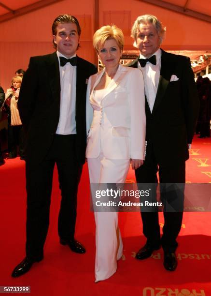 Folk singer Carmen Nebel with her son Gregor Nebel and friend Klaas Bauer arrive for the 'Goldene Kamera' Award on February 2, 2006 in Berlin, Germany