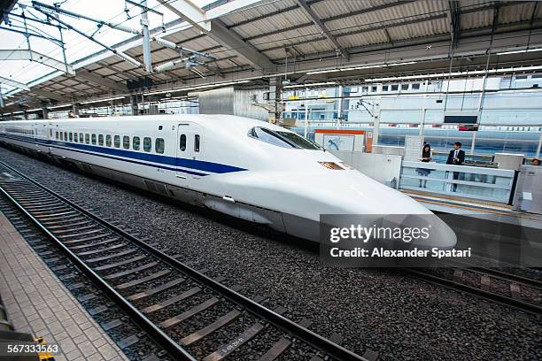 shinkansen (high speed train) at kyoto station - kyoto station stock pictures, royalty-free photos & images