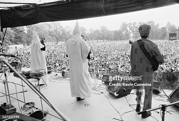 Members of English roots reggae band Steel Pulse performing, in Ku Klux Klan hoods, at the Northern Rock Against Racism Festival in Alexandra Park,...