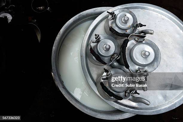 milk for sell, west bengal, india. - boiling stock pictures, royalty-free photos & images