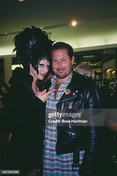 American painter and filmmaker Julian Schnabel and event producer Susanne Bartsch attend a benefit at Barneys New York, New York City, circa 2000.
