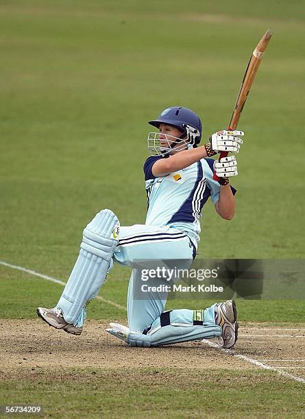 Michelle Goszko of the NSW Breakers hits over the top during the 1st Final between the New South Wales Breakers and Queensland Fire at North Sydney...