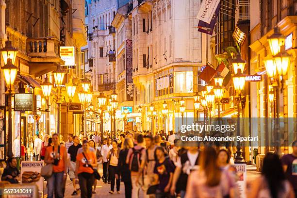 crowded pedestrian street in budapest, hungary - budapest nightlife stock pictures, royalty-free photos & images