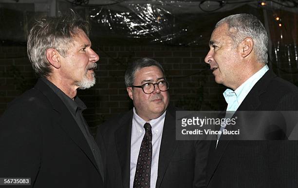 Actor Harrison Ford speaks with Bruce Berman and Hal Gaba of Village Roadshow Pictures at the after party for the premiere of the Warner Bros. Film...