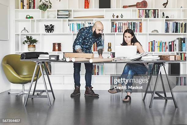 architects working at table in home office - womens draft ストックフォトと画像