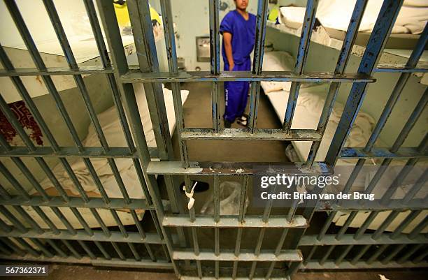 An inmate in a six-bunk cell inside the Men's Central Jail August 8, 2014 in Los Angeles. The cells rarely house all six inmates. Since the passage...