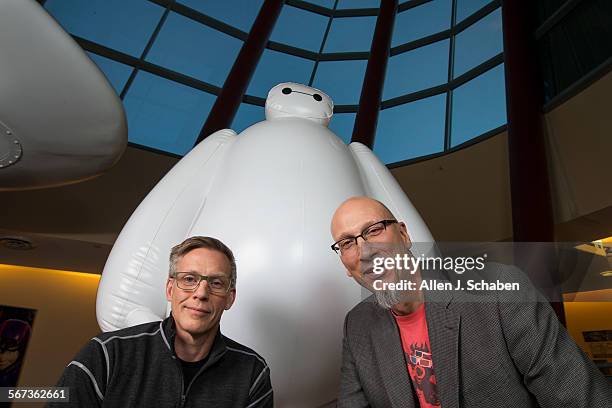 Andy Hendrickson, left, Disney Animation's chief technology officer, and Roy Conli, producer of the Academy Award-nominated film "Big Hero 6" pose...