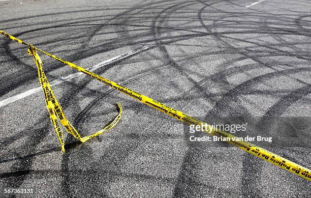 Skid marks at drag racing scene where two pedestrians were killed by the driver of a Ford Mustang who fled after the crime on Plummer Street February...