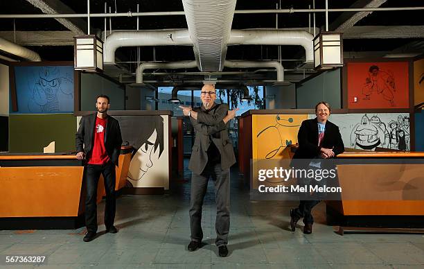 Roy Conli, center, producer of the Disney animated film, Big Hero 6 and co-directors Chris Williams, left, and Don Hall, right, are photographed...