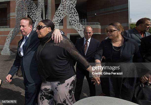 Nona Gaye, middle,daughter of the late Marvin Gaye, leaves the Roybal Federal Courthouse with attorney Richard Busch, left, and her dad's ex-wife...