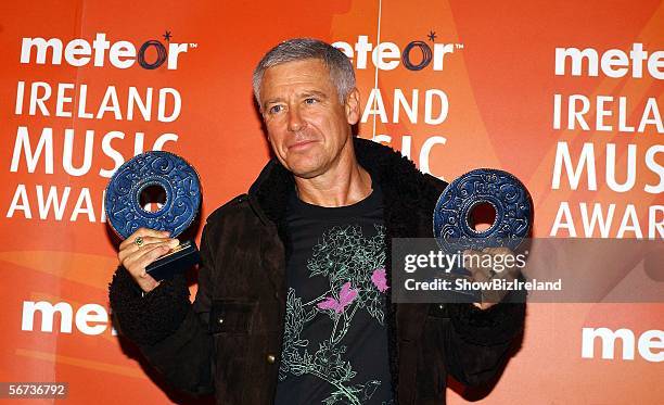 S Adam Clayton poses with their awards for Best Irish Band and Best Live Performance at The Meteor Ireland Music Awards 2006, the annual radio...