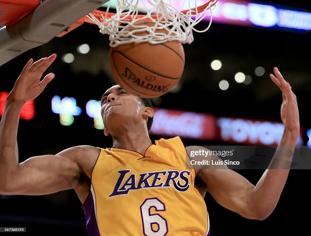 LOS ANGELES, CALIF. - DEC. 23, 2014.  lakwrs guard Jordan Clarkson throws down a breakaway slam dunk