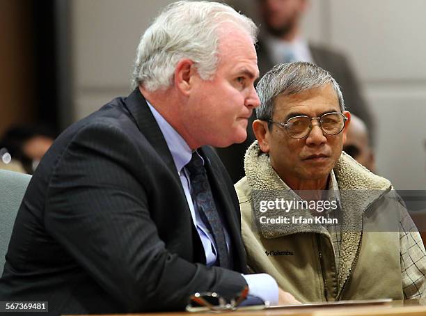 Michael Vuong, right, pleads no contest to being an accessory to fleeing the scene after fatally striking the son of federal judge Dean Pregerson....
