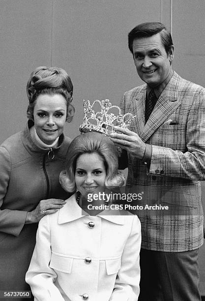 American actress June Lockhart , the 1970 Rose Queen beauty pageant winner Pamela Tedesco, and game show host Bob Barker pose together as Barker...