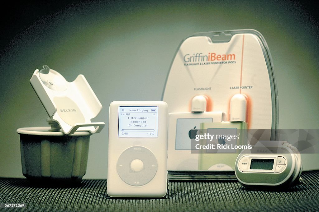 091759.FI.0103.ipod.RL--Los Angeles, Ca.--The popular iPOD, center, with various accessories that ar