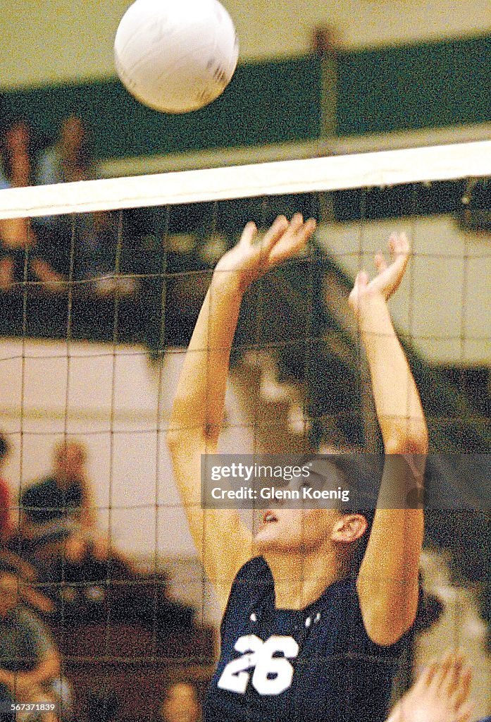 087915.SP.0928.chaparral.2.GMK Chaparral High girls volleyball middle blocker Kelli Tennant, goes up