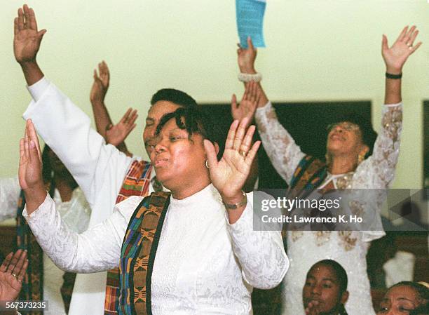 Members of the Southside Christian Palace Church Choir praisinf the lord and singing gospel in an effort to organize South Bay churches through the...