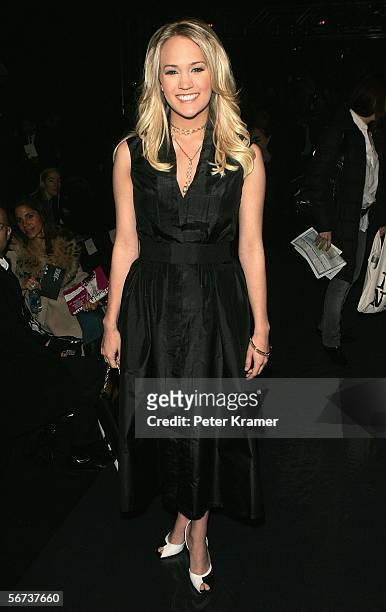 Singer Carrie Underwood attends the Kenneth Cole Fall 2006 fashion show during Olympus Fashion Week at Bryant Park February 3, 2006 in New York City.