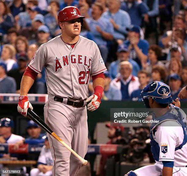 Mike Trout of the Los Angeles Angels reacts after batting against the Kansas City Royals in the third inning during Game Three of the American League...