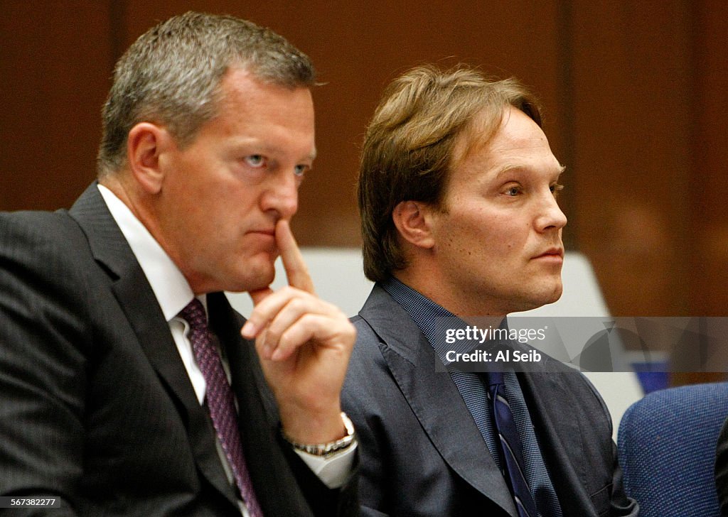 LOS ANGELES, CA JUNE 20, 2014 - UCLA chemistry professor Patrick Harran, right, sits with his atto