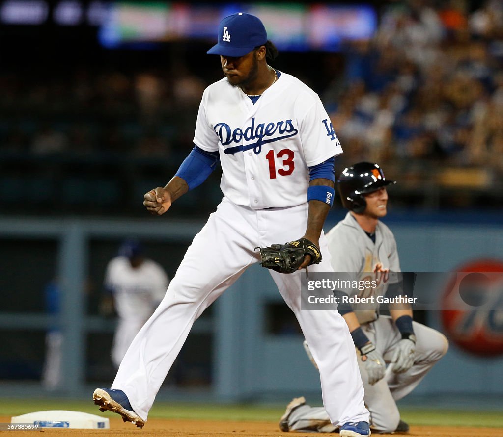 LOS ANGELES, CA, TUESDAY, APRIL 8, 2014 -  Dodgers shortstop Hanley Ramirez thrusts his fist in triu