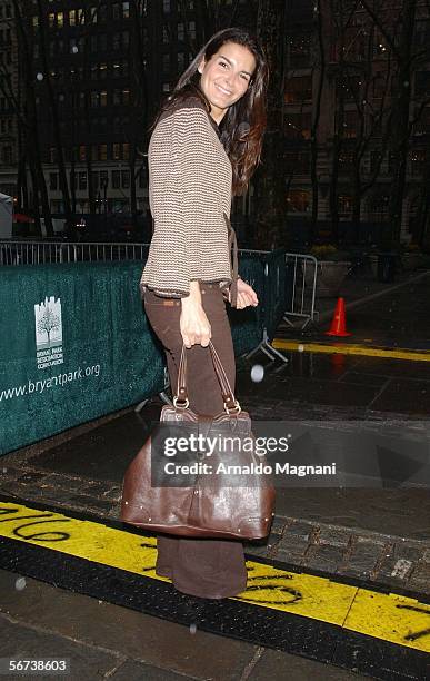 Actress Angie Harmon arrives to see the Kenneth Cole fashion show during Olympus Fashion Week at Bryant Park February 3, 2006 in New York City.