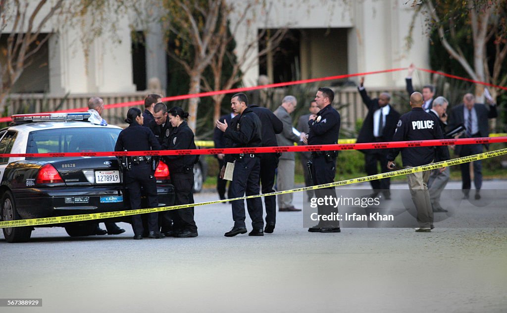 LOS ANGELES, CA JANUARY 14, 2011  LAPD officers conduct their investigation into an officer involv