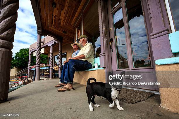 Scene in front of Ed Sandoval Gallery and World Cup Caffe on Paseo Del Pueblo Norte in Taos, July 17, 2014. Photo to illustrate a travel story about...