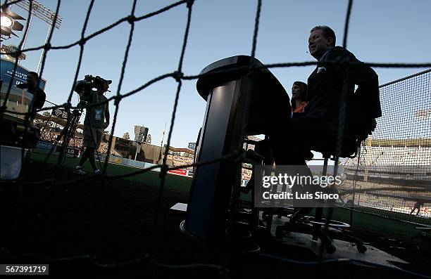 SportsnetLA pregame show commentators Alanna Rizzo, left, and Orel Hershiser prepare for the game between the Dodgers and Angels on Monday, Aug. 4 at...